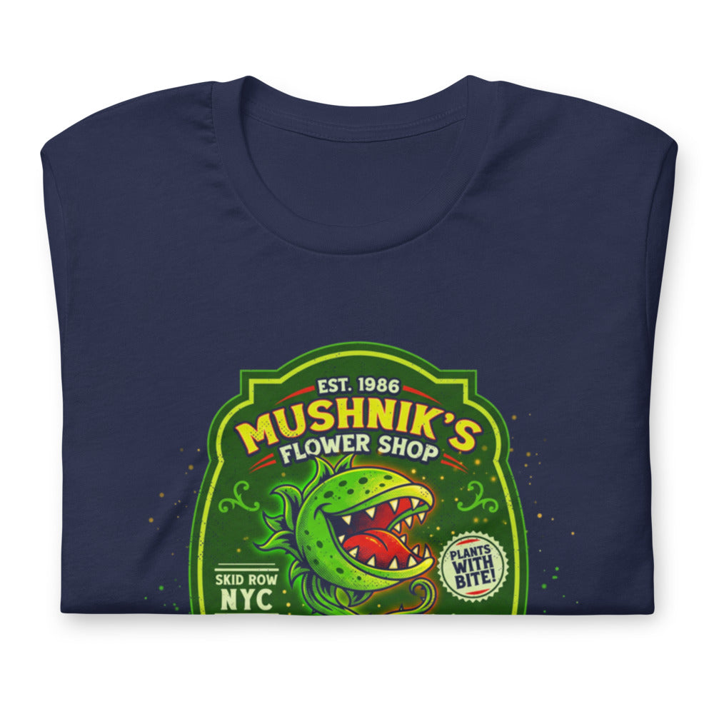 Playera Little Shop of Horrors Mushniks Flower Shop - Doblado