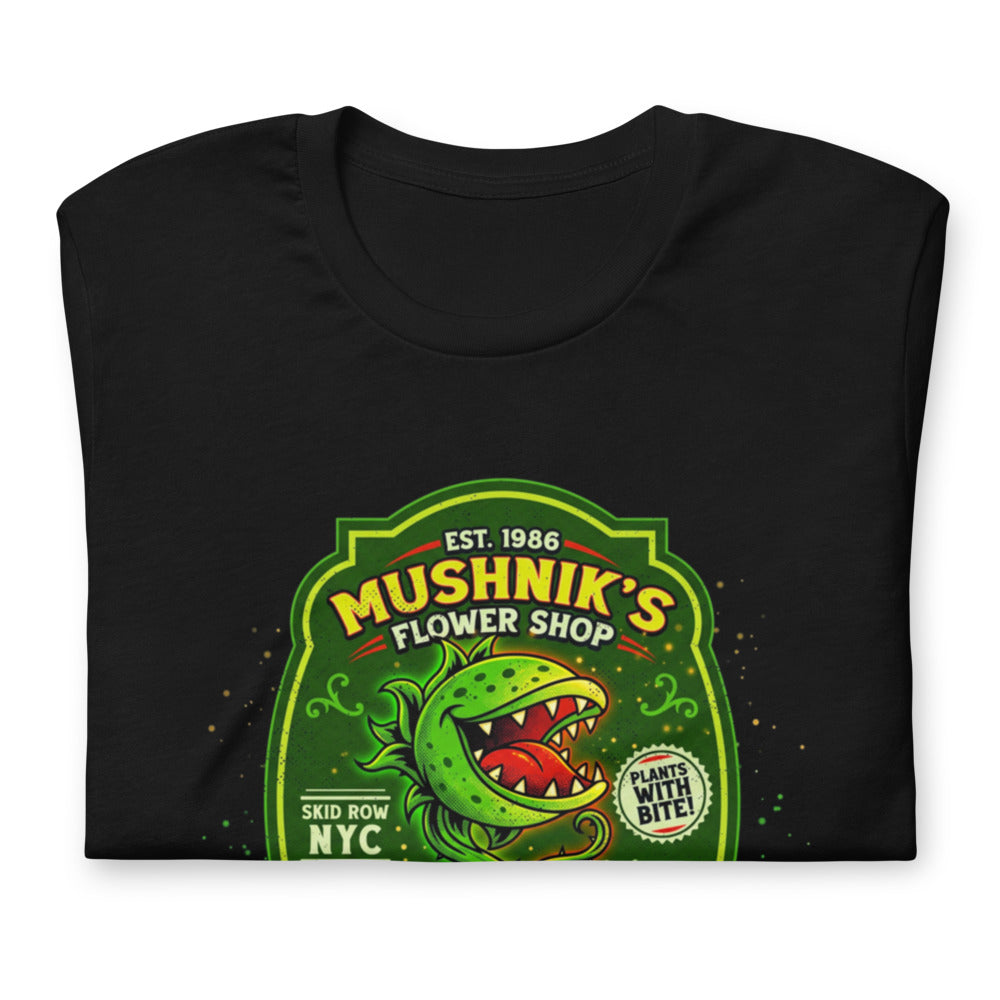Playera Little Shop of Horrors Mushniks Flower Shop - Doblado
